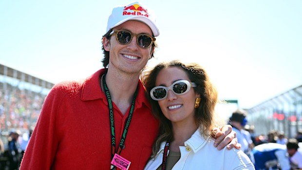Scotty James and his wife, Chloe Stroll, on the grid at the 2024 Australian Formula 1 Grand Prix.