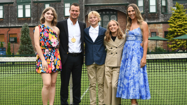 Lleyton Hewit poses with his wife Bec and children Mia, Cruz, and Ava.