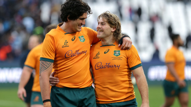 Darcy Swain and Michael Hooper of Australia smile after winning.
