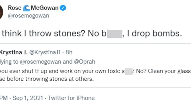 Rose McGowan hits back on Twitter after being told to stop 'throwing stones at others'.