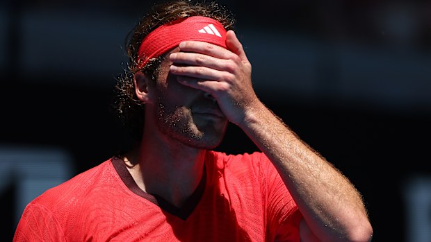 Stefanos Tsitsipas of Greece shows frustration in the Men's Singles First Round match  against Alex Michelsen of the United States during day two of the 2025 Australian Open at Melbourne Park on January 13, 2025 in Melbourne, Australia. (Photo by Graham Denholm/Getty Images)