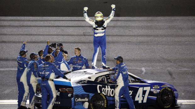 Ricky Stenhouse Jr., driver of the #47 Kroger/Cottonelle Chevrolet, celebrates with his crew after winning the NASCAR Cup Series 65th Annual Daytona 500 at Daytona International Speedway on February 19, 2023 in Daytona Beach, Florida. (Photo by Chris Graythen/Getty Images)