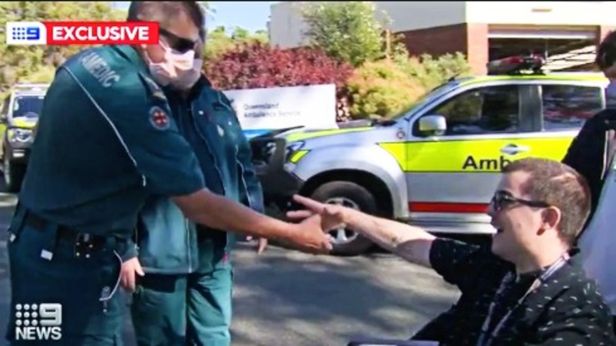 Queensland man reunited with saviour paramedics after defying death ...