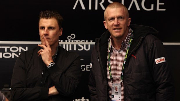 MELBOURNE, AUSTRALIA - JULY 25: Matthew Lloyd, Dustin Fletcher, 2000 premiership players during the 2025 AFL Round 20 match between the Essendon Bombers and the Western Bulldogs at Marvel Stadium on July 25, 2025 in Melbourne, Australia. (Photo by James Wiltshire/AFL Photos via Getty Images)