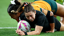 Jazmin Felix-Hotham scores a try against Sariah Paki of Australia.