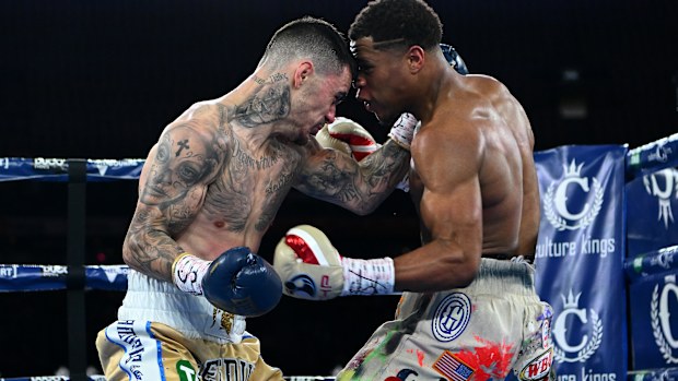 George Kambosos Jr and Devin Haney clash during the World Lightweight Championship bout at Marvel Stadium.