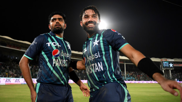 Babar Azam and Mohammad Rizwan of Pakistan celebrate victory after the 2nd IT20 match between Pakistan and England on September 22, 2022 in Karachi, Pakistan. (Photo by Alex Davidson/Getty Images)