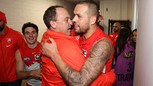 SYDNEY, AUSTRALIA - JULY 13:  Swans head coach John Longmire celebrates with Lance Franklin of the Swans after victory during the round 18 AFL match between Sydney Swans and Western Bulldogs at Sydney Cricket Ground, on July 13, 2023, in Sydney, Australia. (Photo by Mark Metcalfe/AFL Photos/via Getty Images)