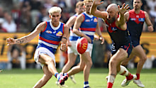 Max Gawn attempts to smother Rory Lobb of the Bulldogs.