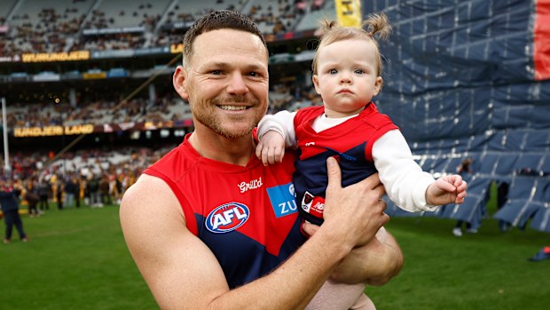 Steven May of the Demons is seen with daughter Millie before his 250th match in 2025.