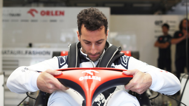 Daniel Ricciardo of Australia and Scuderia AlphaTauri has a seat fitting in the garage during previews ahead of the F1 Grand Prix of Hungary at Hungaroring on July 20, 2023 in Budapest, Hungary. (Photo by Peter Fox/Getty Images)