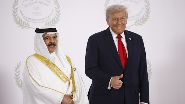 President Donald Trump and Bahrain's King Hamad bin Isa Al Khalifa pose during the family picture at the Gaza International Peace Summit, in Sharm el-Sheikh, Egypt, Monday, October 13 2025.