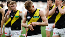 Nick Vlastuin of the Tigers looks dejected after a loss to Collingwood.