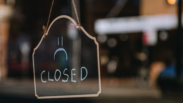 A closed sign on a shopfront.