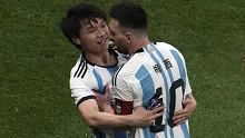 A Chinese fan runs onto the pitch to hug Soccer superstar Lionel Messi during a friendly soccer match against Australia at the Worker's Stadium in Beijing, Thursday, June 15, 2023. (AP Photo/Ng Han Guan)