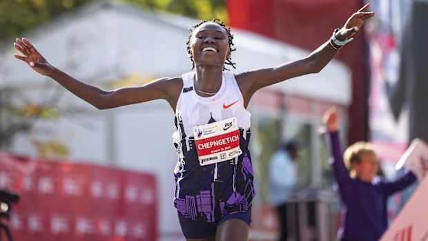 Ruth Chepngetich of Kenya crosses the finish line of the Chicago Marathon to win in world record time.