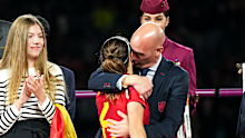 Luis Rubiales kisses Aitana Bonmatí of Spain during the World Cup celebrations.