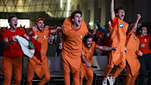 NUVOLA LAVAZZA, TURIN, ITALY - 2024/01/28: The 'Carota Boys' (a group of fans of Jannik Sinner dressed up as carrots) celebrate a point during an event organized at Nuvola Lavazza to watch live on a big screen the Australian Open Final between Jannik Sinner of Italy and Daniil Medvedev of Russia. Jannik Sinner won 3-6, 3-6, 6-4, 6-4, 6-3 claiming his first Grand Slam title. (Photo by Nicolò Campo/LightRocket via Getty Images)