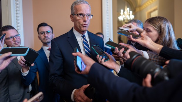 Speaking to reporters, Senate Majority Leader John Thune, R-S.D., responds to Senate Democratic Leader Chuck Schumer to reopen the government if Republicans extend expiring health care subsidies for one year, at the Capitol in Washington, Friday, Nov. 7, 2025, day 38 of the government shutdown. 