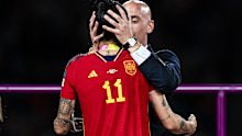 Luis Rubiales kisses Jennifer Hermoso during the medal ceremony.