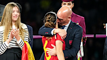 Luis Rubiales kisses Aitana Bonmatí of Spain during the World Cup celebrations.