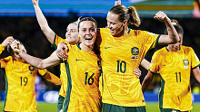 Hayley Raso and Emily Van Egmond celebrate after the Matildas' convincing 2-0 win over Denmark.