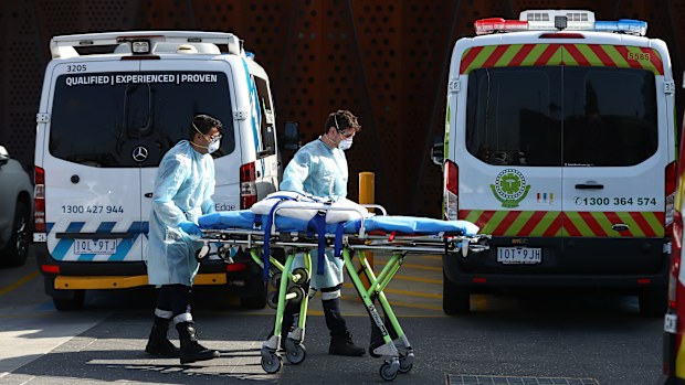  Medical transport workers prepare to enter the Epping Aged Care Home on July 29, 2020 in Melbourne, Australia. 