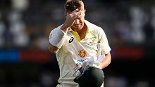 David Warner of Australia looks dejected after being dismissed by Kagiso Rabada of South Africa. (Photo by Matt Roberts - CA/Cricket Australia via Getty Images)