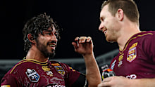 Johnathan Thurston with Queensland teammate Michael Morgan.