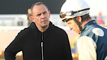 Chris Waller speaking to Buckaroo's trackwork jockey ahead of the Caulfield Cup.