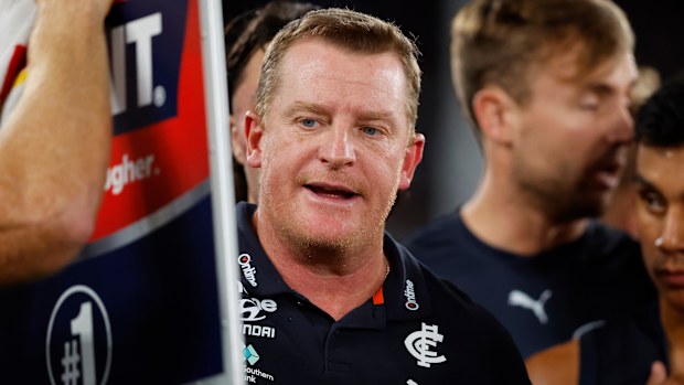 MELBOURNE, AUSTRALIA - APRIL 23: Michael Voss, Senior Coach of the Blues addresses his players during the 2023 AFL Round 06 match between the Carlton Blues and the St Kilda Saints at Marvel Stadium on April 23, 2023 in Melbourne, Australia. (Photo by Dylan Burns/AFL Photos)