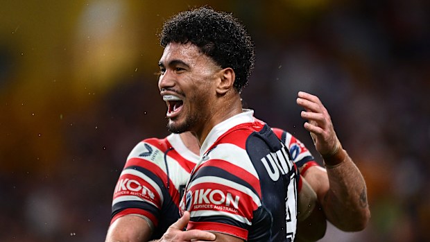 BRISBANE, AUSTRALIA - MAY 02: Robert Toia of the Roosters celebrates with team mates after scoring a try during the round nine NRL match between the Sydney Roosters and Dolphins at Suncorp Stadium on May 02, 2025, in Brisbane, Australia. (Photo by Hannah Peters/Getty Images)