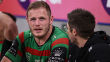 Tom Burgess looks on from the sidelines during the Rabbitohs' finals clash against the Roosters.