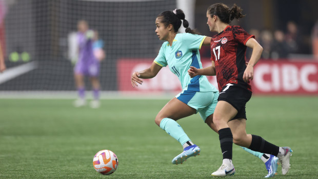Mary Fowler controls the ball against Canada.