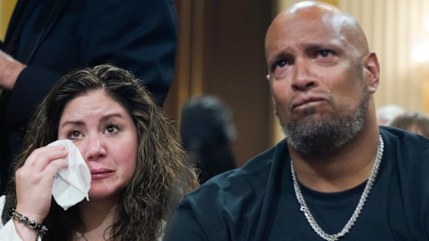 US Capitol Police Sargent Harry Dunn, right, and Sandra Garza, the long-time partner of Capitol Hill Police Officer Brian Sicknick who died shortly after the January 6 attack.