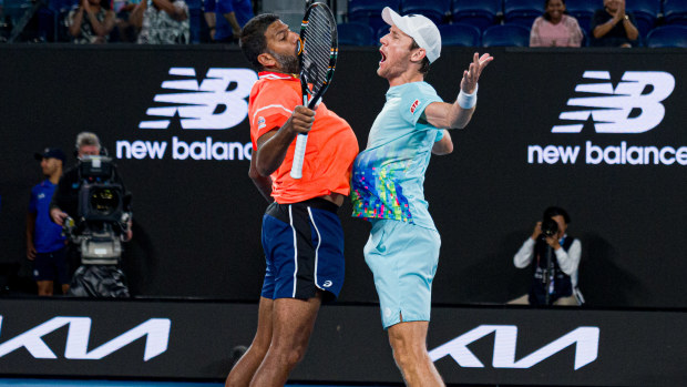 Rohan Bopanna and Matthew Ebden celebrate winning match point during their men's doubles semi-final match at the 2024 Australian Open.