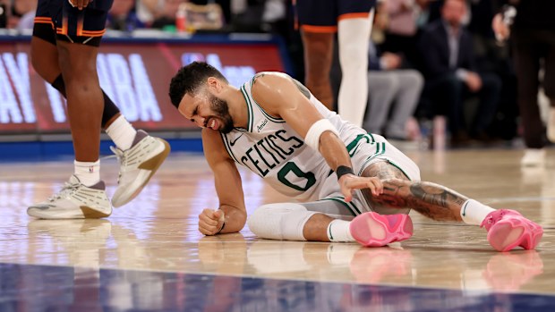 Jayson Tatum of the Boston Celtics lays on the ground after being injured against the New York Knicks during the fourth quarter in Game Four of the Eastern Conference Second Round NBA Playoffs.