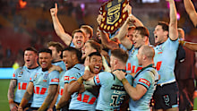 NSW Blues players celebrate after lifting the shield as winners of the 2024 State of Origin series.