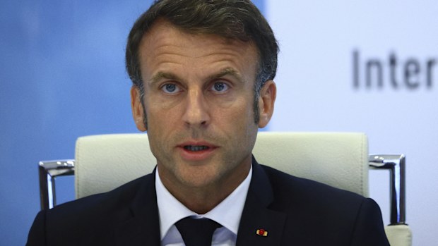 French President Emmanuel Macron speaks following a government emergency meeting after riots erupted for the third night in a row across the country, at the Interior Ministry in Paris, Friday, June 30, 2023.  