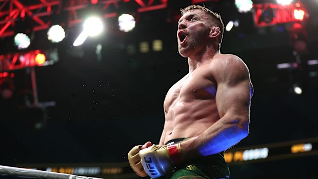 Dricus Du Plessis celebrates winning his fight against Israel Adesanya.