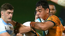 Tevita Alatini of Australia is tackled during the under-20 Rugby Championship.