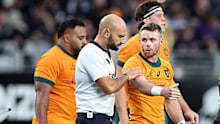 Referee Andrea Piardi talks with Ryan Lonergan.