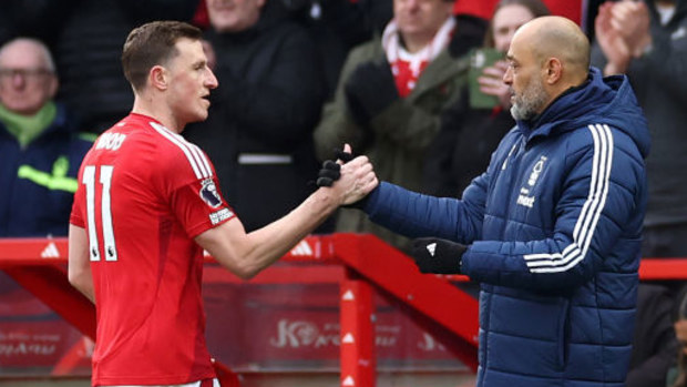 Chris Wood embraces Nuno Espirito Santo of Nottingham Forest.
