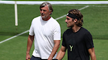 Stefanos Tsitsipas of Greece speaks with his coach Goran Ivanisevic.