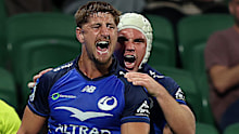 Zac Lomax of the Force celebrates a try.