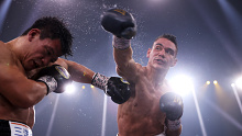 SYDNEY, AUSTRALIA - NOVEMBER 17: Tim Tszyu punches Takeshi Inoue during the WBO Global and Asia Pacific Super Welterweight title bout between Tim Tszyu of Australia and Takeshi Inoue of Japan at Qudos Bank Arena on November 17, 2021 in Sydney, Australia. (Photo by Mark Kolbe/Getty Images)