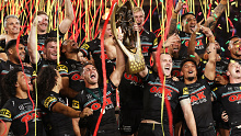Nathan Cleary and Isaah Yeo of the Panthers hold aloft the Provan-Summons Trophy after winning the 2023 NRL Grand Final match between Penrith Panthers and Brisbane Broncos at Accor Stadium on October 01, 2023 in Sydney, Australia. (Photo by Matt King/Getty Images)