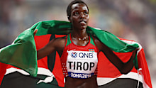 DOHA, QATAR - SEPTEMBER 28:  Agnes Jebet Tirop of Kenya celebrates winning bronze in the Women's 10,000 Metres final during day two of 17th IAAF World Athletics Championships Doha 2019 at Khalifa International Stadium on September 28, 2019 in Doha, Qatar. (Photo by Alexander Hassenstein/Getty Images for IAAF)