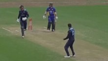 Joel Davies celebrates the wicket.