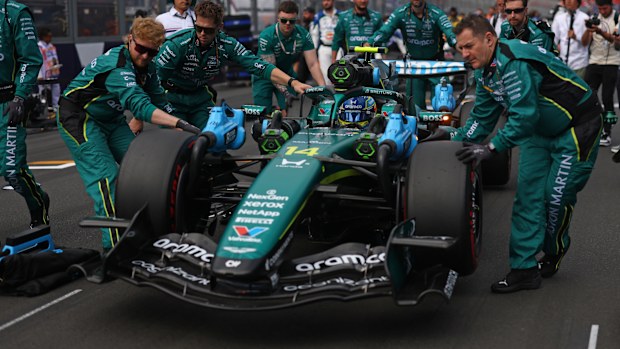 MELBOURNE, AUSTRALIA - MARCH 08: Fernando Alonso of Spain driving the (14) Aston Martin F1 Team AMR26 Honda arrives on the grid during the F1 Grand Prix of Australia at Albert Park Grand Prix Circuit on March 08, 2026 in Melbourne, Australia. (Photo by Alastair Staley/LAT Images)